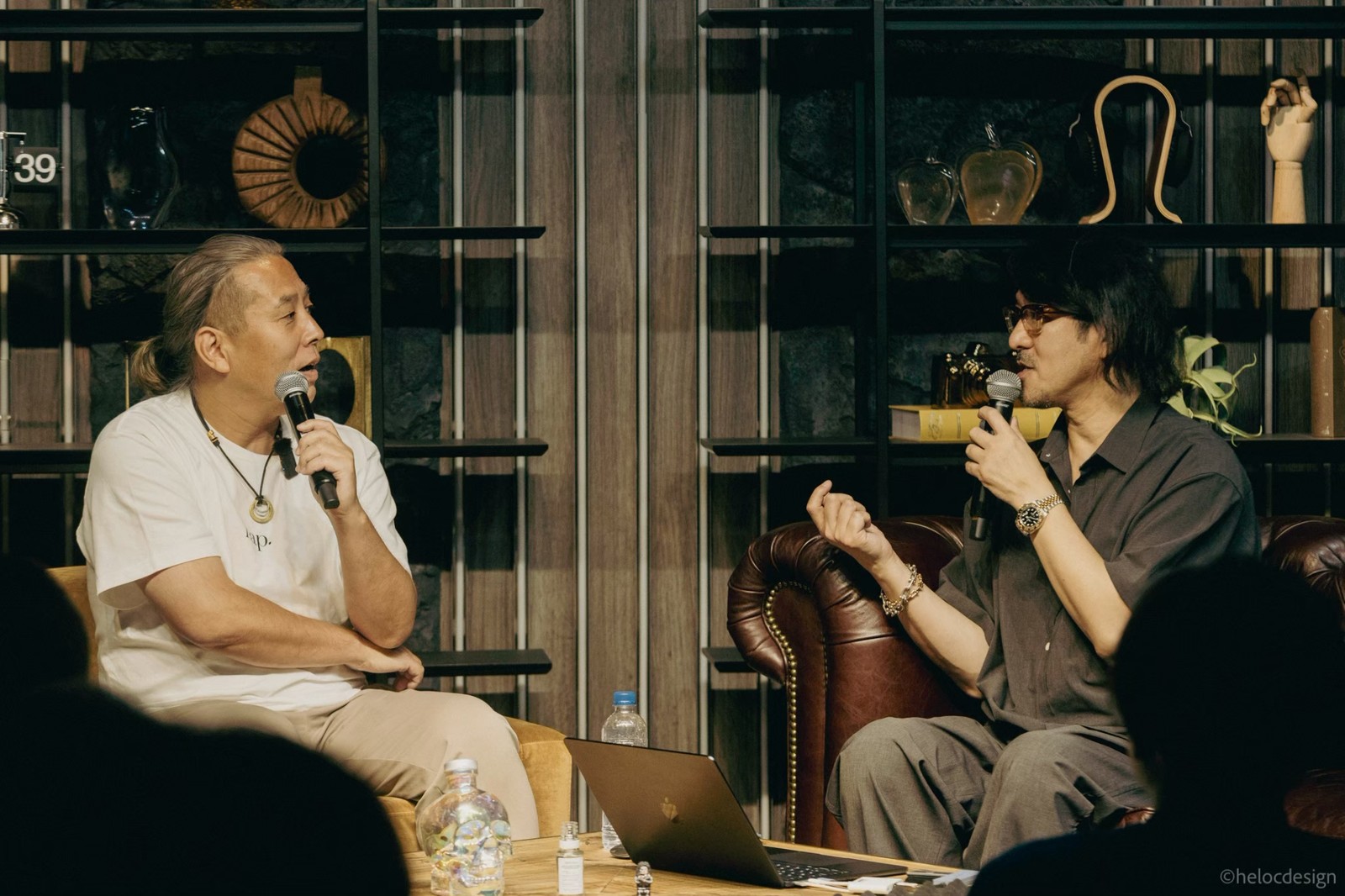 Tadahiro Koto speaking with another speaker at his talk event in Akasaka, Tokyo